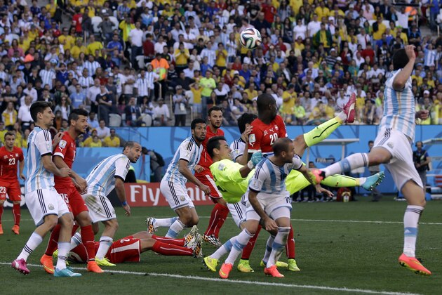 Switzerland goalkeeper Diego Benaglio joins the attack near the end of the World Cup round of 16 soccer match between Argentina and Switzerland at the Itaquerao Stadium in Sao Paulo, Brazil, Tuesday, July 1, 2014. (AP Photo/Sergei Grits)