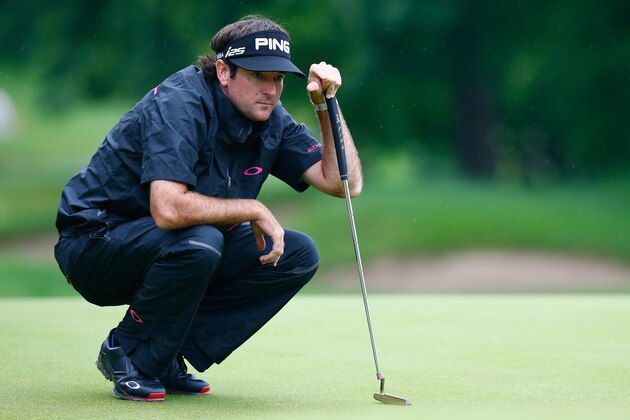 CROMWELL, CT - JUNE 19: Bubba Watson of the United States studies his putt on the 15th hole during the first round of the Travelers Championship golf tournament at the TPC River Highlands on June 19, 2014 in Cromwell, Connecticut.  (Photo by Jared Wickerham/Getty Images)