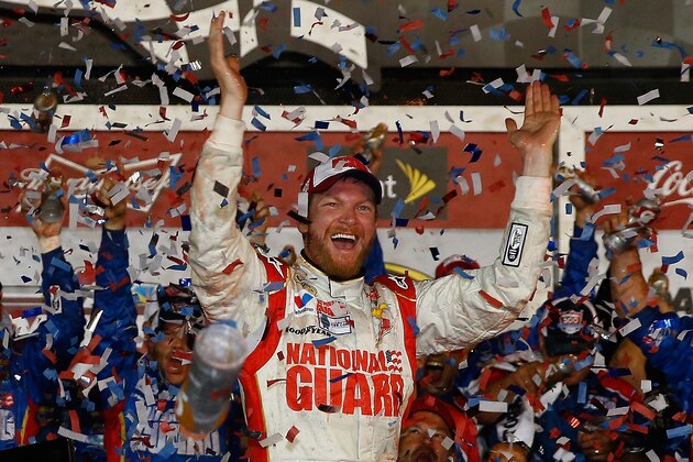 DAYTONA BEACH, FL - FEBRUARY 23:  Dale Earnhardt Jr., driver of the #88 National Guard Chevrolet, celebrates in Victory Lane after winning during the NASCAR Sprint Cup Series Daytona 500 at Daytona International Speedway on February 23, 2014 in Daytona Beach, Florida.  (Photo by Tom Pennington/Getty Images)