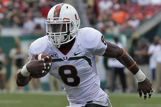 Miami running back Duke Johnson runs during the second quarter of an NCAA college football game against South Florida Saturday, Sept. 28, 2013, in Tampa, Fla. (AP Photo/Chris O'Meara)
