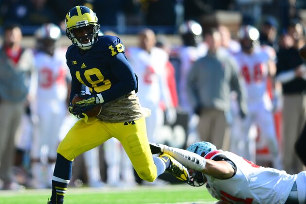 Nov 30, 2013; Ann Arbor, MI, USA; Michigan Wolverines defensive back Blake Countess (18) intercepts a pass during the second quarter against the Ohio State Buckeyes at Michigan Stadium. Mandatory Credit: Andrew Weber-USA TODAY Sports