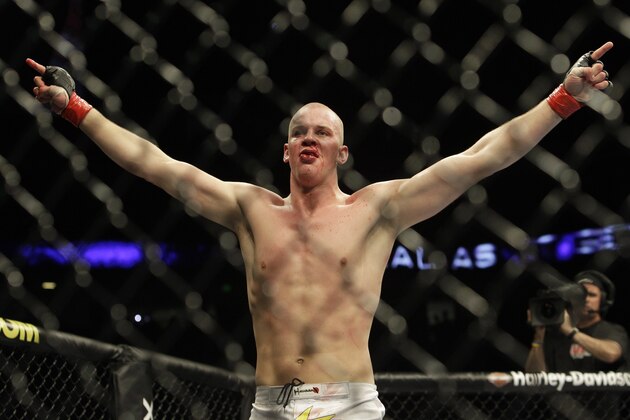 Stefan Struve celebrates after beating Christian Morecraft by TKO in the second round during a heavyweight UFC mixed martial arts match in Oakland, Calif., Saturday, Aug. 7, 2010. (AP Photo/Jeff Chiu)