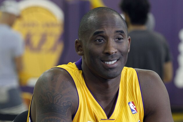 FILE - In this Sept. 28, 2013 file photo, Los Angeles Lakers guard Kobe Bryant talks during the NBA basketball teams media day, in El Segundo, Calif. The Lakers have signed Bryant to a 2-year contract extension. General manager Mitch Kupchak made the announcement Monday, Nov. 25, 2013, ending speculation that Bryant could end up with another team after this season. (AP Photo/Alex Gallardo, File)