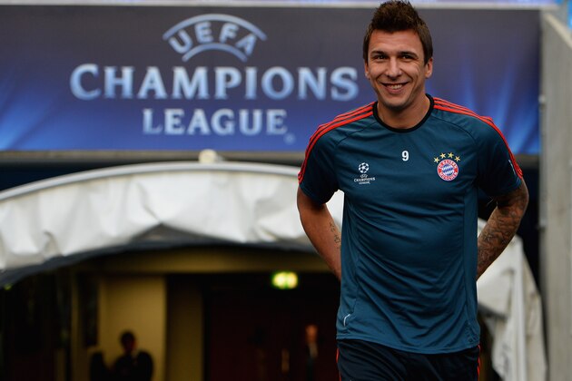 MANCHESTER, ENGLAND - OCTOBER 01: Mario Mandzukic of FC Bayern Muenchen walks out of the tunnel during a training session at Etihad Stadium on October 1, 2013 in Manchester, England.  (Photo by Laurence Griffiths/Getty Images)