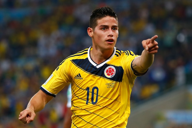 RIO DE JANEIRO, BRAZIL - JUNE 28:  James Rodriguez of Colombia celebrates scoring his team's second goal and his second of the game during the 2014 FIFA World Cup Brazil round of 16 match between Colombia and Uruguay at Maracana on June 28, 2014 in Rio de Janeiro, Brazil.  (Photo by Clive Rose/Getty Images)