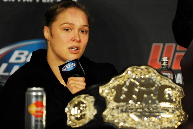 Feb 22, 2014; Las Vegas, NV, USA; UFC women's bantamweight champion Ronda Rousey answers questions from reporters after defending her title against Sara McMann in the first round of the main event of UFC 170 at Mandalay Bay. Mandatory Credit: Stephen R. Sylvanie-USA TODAY Sports Feb 22, 2014; Las Vegas, NV, USA; UFC women's bantamweight champion Ronda Rousey answers questions from reporters after defending her title against Sara McMann in the first round of the main event of UFC 170 at Mandalay Bay. Mandatory Credit: Stephen R. Sylvanie-USA TODAY Sports