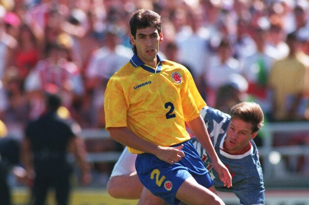 22 JUN 1994:   ANDRES ESCOBAR #2 OF COLOMBIA IN ACTION SHIELDS THE BALL FROM ERIC WYNALDA OF THE USA DURING THE 1994 WORLD CUP MATCH AT THE ROSE BOWL IN PASADENA, CALIFORNIA. Mandatory Credit: Shaun Botterill/ALLSPORT