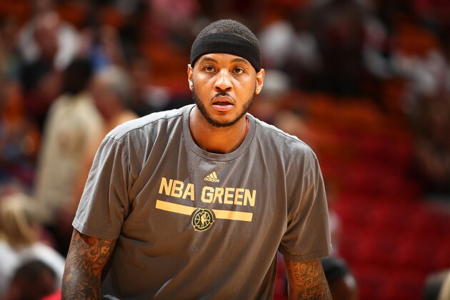 MIAMI, FL - APRIL 6: Carmelo Anthony #7 of the New York Knicks warms up on the court before the game against the Miami Heat on April 6, 2014 at American Airlines Arena in Miami, Florida.  NOTE TO USER: User expressly acknowledges and agrees that, by downloading and or using this photograph, User is consenting to the terms and conditions of the Getty Images License Agreement. Mandatory Copyright Notice: Copyright 2014 NBAE  (Photo by Nathaniel S. Butler/NBAE via Getty Images)
