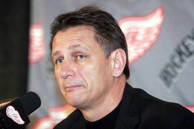 DETROIT - NOVEMBER 22:  General Manager, Ken Holland, of the Detroit Red Wings listens to a question during a press conference on November 22, 2005 at Joe Louis Arena in Detroit, Michigan.  The team was holding a press conference on the condition of player, Jiri Fischer, who collapsed when his heart stopped during a game on November 21. Fisher is listed in improved condition. (Photo by Tom Pidgeon/Getty Images)