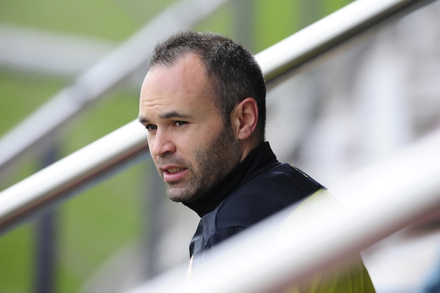 FC Barcelona's Andres Iniesta attends a training session at the Sports Center FC Barcelona Joan Gamper in San Joan Despi, Spain, Monday, March 31, 2014. FC Barcelona will face Atletico Madrid in a first leg quarter-final Champions League soccer match on April 1. (AP Photo/Manu Fernandez)