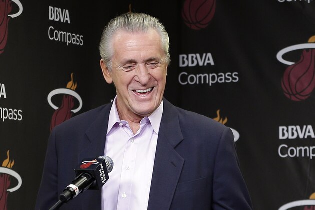 Miami Heat President Pat Riley smiles as he introduces Shabazz Napier at a news conference in Miami, Monday, June 30, 2014. The Heat acquired the draft rights to Connecticut guard Shabazz Napier in a trade with the Charlotte Hornets on Thursday night, giving up the 26th and 55th picks to make the deal happen, along with a future second-round choice and cash considerations. (AP Photo/Alan Diaz)