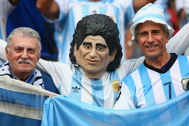 PORTO ALEGRE, BRAZIL - JUNE 25:  Argentina fans show their colours ahead of  the 2014 FIFA World Cup Brazil Group F match between Nigeria and Argentina at Estadio Beira-Rio on June 25, 2014 in Porto Alegre, Brazil.  (Photo by Ian Walton/Getty Images)