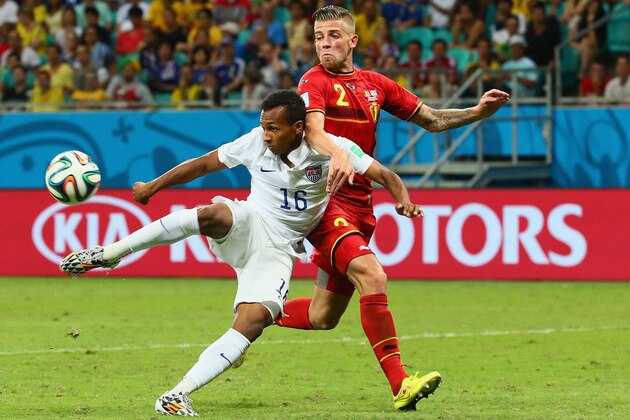 SALVADOR, BRAZIL - JULY 01: Julian Green of the United States scores his team's first goal in extra time against Toby Alderweireld of Belgium during the 2014 FIFA World Cup Brazil Round of 16 match between Belgium and the United States at Arena Fonte Nova on July 1, 2014 in Salvador, Brazil.  (Photo by Kevin C. Cox/Getty Images)