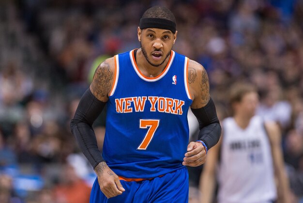 Jan 5, 2014; Dallas, TX, USA; New York Knicks small forward Carmelo Anthony (7) comes back up the court during the game against the Dallas Mavericks at the American Airlines Center. The Knicks defeated the Mavericks 92-80. Mandatory Credit: Jerome Miron-USA TODAY Sports