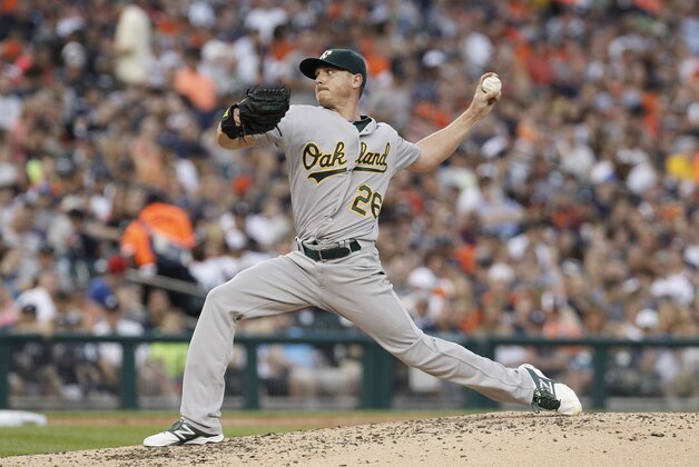 Oakland Athletics' Scott Kazmir pitches against the Detroit Tigers during a baseball game Monday, June 30, 2014, in Detroit. (AP Photo/Duane Burleson