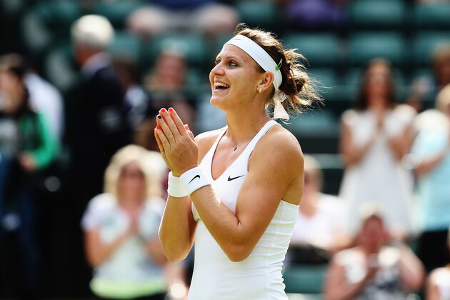 LONDON, ENGLAND - JULY 01: Lucie Safarova of Czech Republic celebrates winning her Ladies' Singles quarter-final match against Ekaterina Makarova of Russia on day eight of the Wimbledon Lawn Tennis Championships at the All England Lawn Tennis and Croquet Club on July 1, 2014 in London, England. (Photo by Jan Kruger/Getty Images) LONDON, ENGLAND - JULY 01: Lucie Safarova of Czech Republic celebrates winning her Ladies' Singles quarter-final match against Ekaterina Makarova of Russia on day eight of the Wimbledon Lawn Tennis Championships at the All England Lawn Tennis and Croquet Club on July 1, 2014 in London, England. (Photo by Jan Kruger/Getty Images)