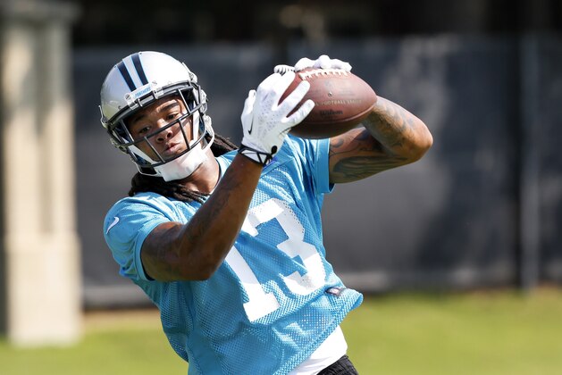 Carolina Panthers wide receiver Kelvin Benjamin catches the ball at NFL football minicamp in Charlotte, N.C., Thursday, June 19, 2014. (AP Photo/Nell Redmond)