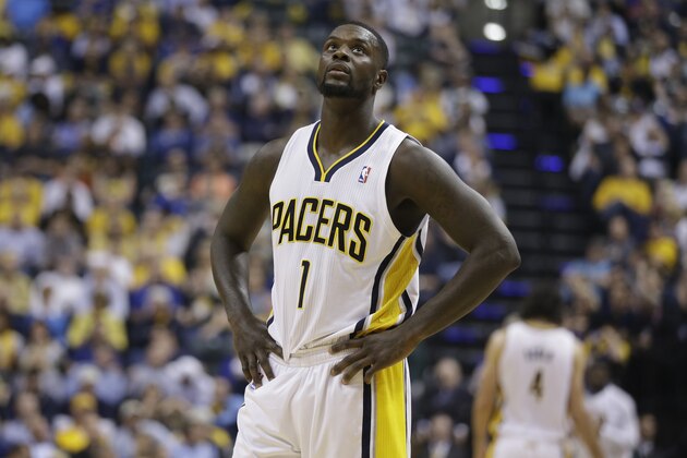 Indiana Pacers' Lance Stephenson (1) looks up at the scoreboard during the first half in Game 5 of an opening-round NBA basketball playoff series against the Atlanta Hawks Monday, April 28, 2014, in Indianapolis. (AP Photo/Darron Cummings)