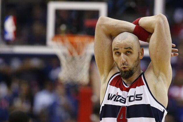 Washington Wizards center Marcin Gortat reacts after a play in the closing minutes of Game 6 of an Eastern Conference semifinal NBA basketball playoff series against the Indiana Pacers in Washington, Thursday, May 15, 2014. The Pacers defeated the Wizards 93-80 to advance to the Eastern Conference Finals. (AP Photo/Alex Brandon)