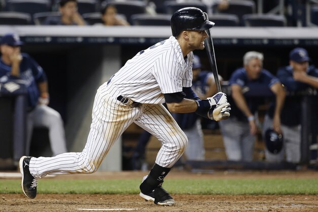 New York Yankees Derek Jeter grounds out for the final out in the Yankees 12-inning, 4-3 loss to the Tampa Bay Rays in a baseball game at Yankee Stadium in New York, Monday, June 30, 2014.  (AP Photo/Kathy Willens)