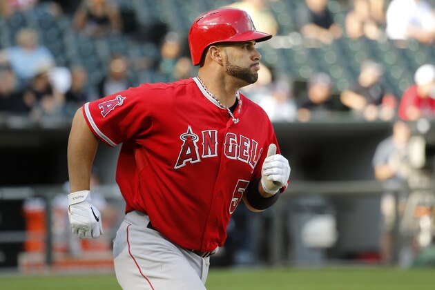 Los Angeles Angels' Albert Pujols watches his home run off Chicago White Sox starting pitcher Hector Noesi during the fifth inning of a baseball game Tuesday, July 1, 2014, in Chicago. (AP Photo/Charles Rex Arbogast) Los Angeles Angels' Albert Pujols watches his home run off Chicago White Sox starting pitcher Hector Noesi during the fifth inning of a baseball game Tuesday, July 1, 2014, in Chicago. (AP Photo/Charles Rex Arbogast)
