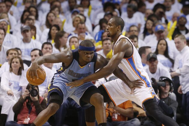 Memphis Grizzlies forward Zach Randolph (50) drives against Oklahoma City Thunder forward Serge Ibaka (9) during Game 5 of an opening-round NBA basketball playoff series in Oklahoma City, Wednesday, April 30, 2014. Memphis won 100-99 in overtime. (AP Photo)