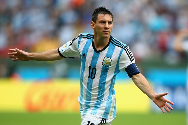 PORTO ALEGRE, BRAZIL - JUNE 25:  Lionel Messi of Argentina celebrates scoring his team's second goal and his second of the game during the 2014 FIFA World Cup Brazil Group F match between Nigeria and Argentina at Estadio Beira-Rio on June 25, 2014 in Porto Alegre, Brazil.  (Photo by Ian Walton/Getty Images)