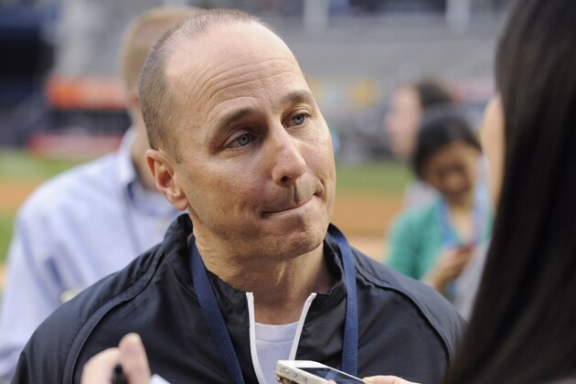 New York Yankees general manager Brian Cashman speaks to the media before their baseball game against the Boston Red Sox Friday, April 11, 2014, at Yankee Stadium in New York. (AP Photo/Bill Kostroun)