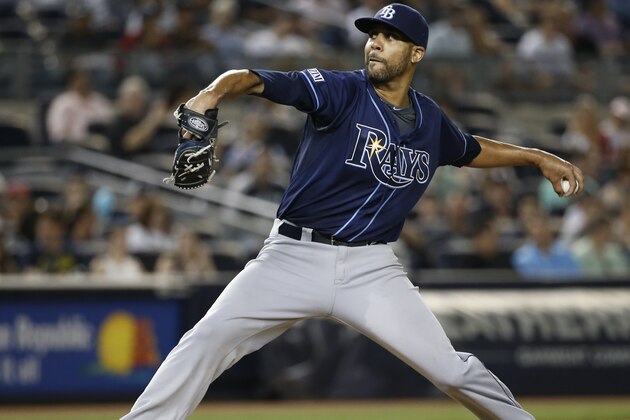 Tampa Bay Rays starting pitcher David Price delivers in the seventh inning of a baseball game against the New York Yankees at Yankee Stadium in New York, Tuesday, July 1, 2014.  (AP Photo/Kathy Willens)