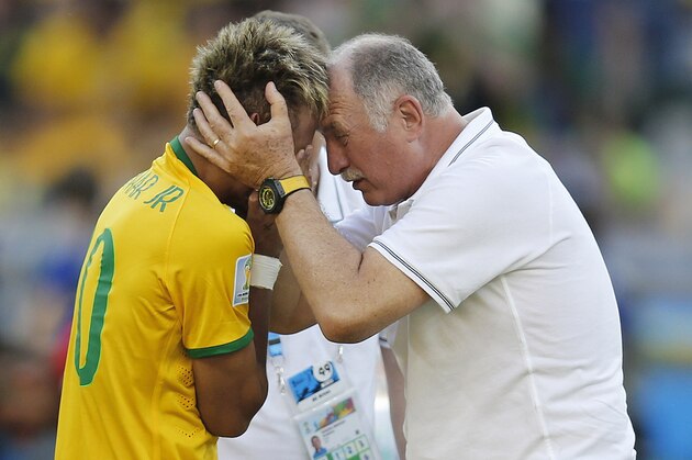 Brazil's coach Luiz Felipe Scolari embraces Brazil's Neymar after the World Cup round of 16 soccer match between Brazil and Chile at the Mineirao Stadium in Belo Horizonte, Brazil, Saturday, June 28, 2014. Brazil won 3-2 on penalties. (AP Photo/Frank Augstein)
