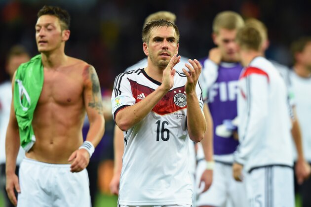 PORTO ALEGRE, BRAZIL - JUNE 30:  Philipp Lahm of Germany acknowledges the crowd after defeating Algeria 2-1 during the 2014 FIFA World Cup Brazil Round of 16 match between Germany and Algeria at Estadio Beira-Rio on June 30, 2014 in Porto Alegre, Brazil.  (Photo by Matthias Hangst/Getty Images)