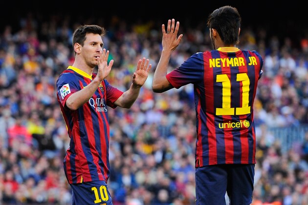 BARCELONA, SPAIN - APRIL 05:  Neymar of FC Barcelona celebrates with his team-mate Lionel Messi (L) of FC Barcelona during the La Liga match between FC Barcelona and Real Betis Balompie at Camp Nou on April 5, 2014 in Barcelona, Spain.  (Photo by David Ramos/Getty Images)