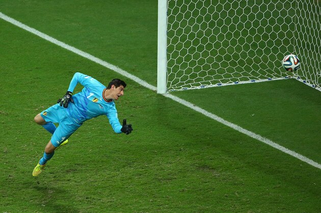 SALVADOR, BRAZIL - JULY 01: Thibaut Courtois of Belgium fails to stop the shot of Julian Green of the United States (not pictured) for his team's first goal in extra time during the 2014 FIFA World Cup Brazil Round of 16 match between Belgium and the United States at Arena Fonte Nova on July 1, 2014 in Salvador, Brazil.  (Photo by Robert Cianflone/Getty Images)