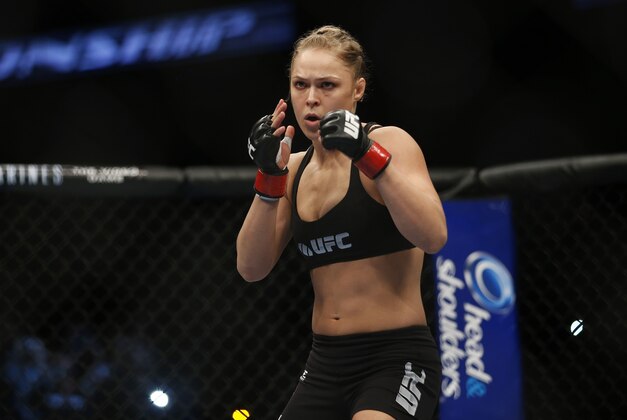 Ronda Rousey gets ready for her UFC 157 women's bantamweight championship mixed martial arts match with Liz Carmouche in Anaheim, Calif., Saturday, Feb. 23, 2013. Rousey won by tapout in the first round. (AP Photo/Jae C. Hong)