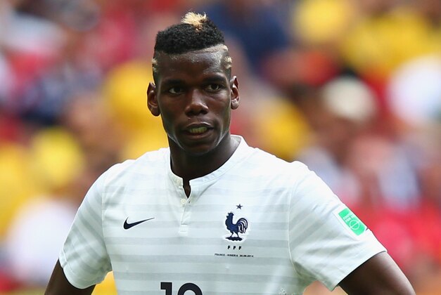BRASILIA, BRAZIL - JUNE 30: Paul Pogba of France reacts during the 2014 FIFA World Cup Brazil Round of 16 match between France and Nigeria at Estadio Nacional on June 30, 2014 in Brasilia, Brazil.  (Photo by Ian Walton/Getty Images)