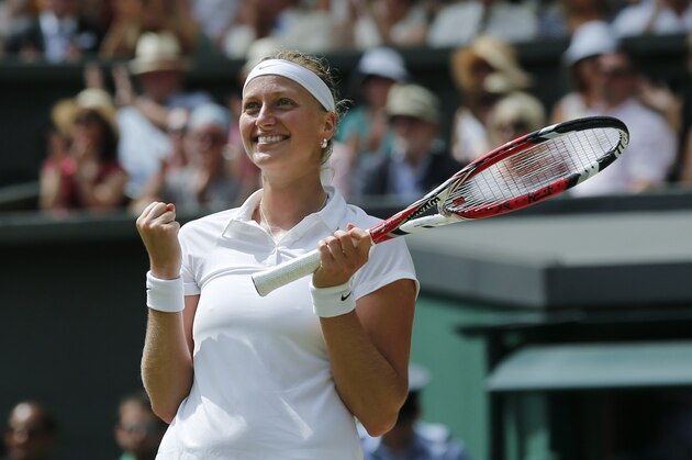 Petra Kvitova of Czech Republic celebrates after defeating Lucie Safarova of Czech Republic in their women’s singles semifinal match at the All England Lawn Tennis Championships in Wimbledon, London, Thursday, July 3, 2014. (AP Photo/Ben Curtis)