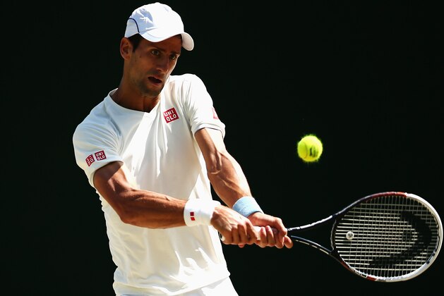 LONDON, ENGLAND - JULY 03:  Novak Djokovic of Serbia during a practice session on day ten of the Wimbledon Lawn Tennis Championships at the All England Lawn Tennis and Croquet Club  on July 3, 2014 in London, England.  (Photo by Dan Kitwood/Getty Images)