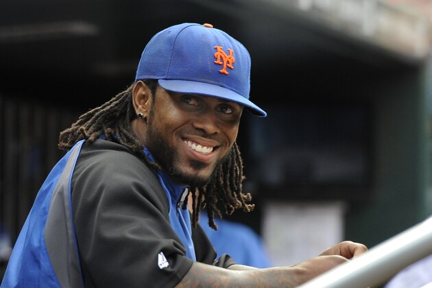 New York Mets' Jose Reyes smiles in the dugout in the ninth inning of a baseball game against the Cincinnati Reds on Wednesday, Sept. 28, 2011, at Citi Field in New York. Reyes is vying for the National League batting title. The Mets won 3-0. (AP Photo/Kathy Kmonicek)
