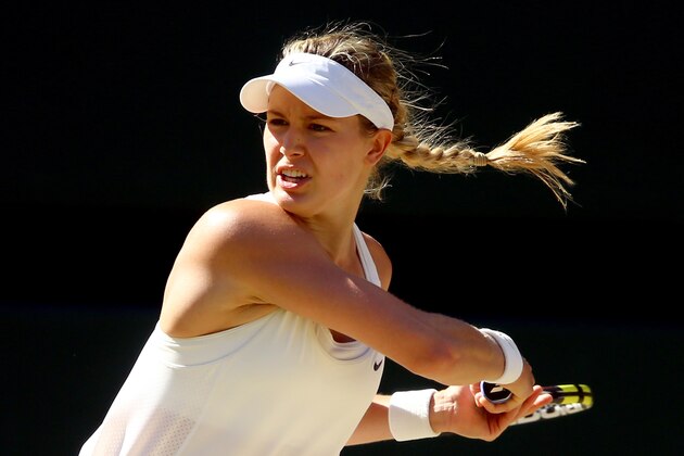 LONDON, ENGLAND - JULY 03:  Eugenie Bouchard of Canada during her Ladies' Singles semi-final match against Simona Halep of Romania on day ten of the Wimbledon Lawn Tennis Championships at the All England Lawn Tennis and Croquet Club  on July 3, 2014 in London, England.  (Photo by Al Bello/Getty Images)