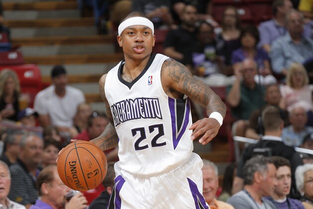 SACRAMENTO, CA - MARCH 23: Isaiah Thomas #22 of the Sacramento Kings brings the ball up the court against the Milwaukee Bucks on March 23, 2014 at Sleep Train Arena in Sacramento, California. NOTE TO USER: User expressly acknowledges and agrees that, by downloading and or using this photograph, User is consenting to the terms and conditions of the Getty Images Agreement. Mandatory Copyright Notice: Copyright 2014 NBAE (Photo by Rocky Widner/NBAE via Getty Images)