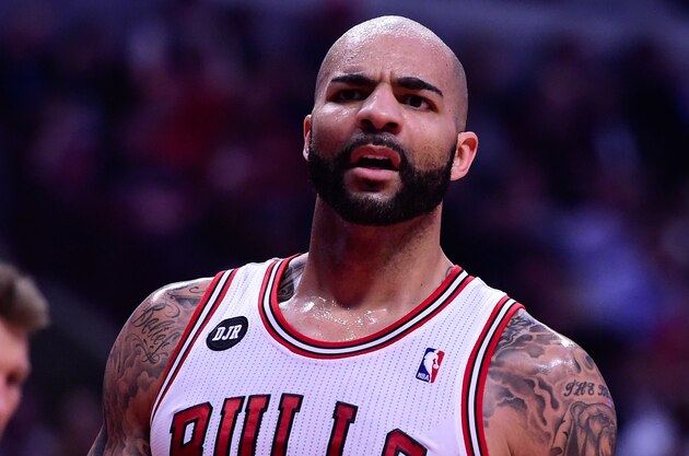 Apr 14, 2014; Chicago, IL, USA; Chicago Bulls forward Carlos Boozer (5) during the first quarter at the United Center. Mandatory Credit: Mike DiNovo-USA TODAY Sports