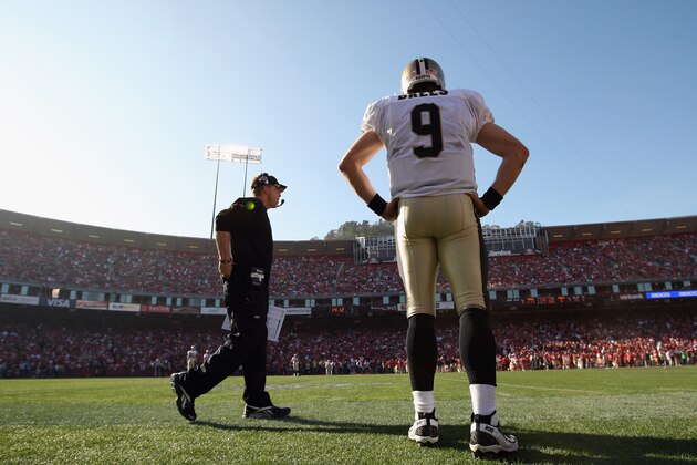 SAN FRANCISCO, CA - JANUARY 14:  Head coach Sean Payton and quarterback Drew Brees #9 of the New Orleans Saints watch from the sidelines during the second quarter of the NFC Divisional playoff game against the San Francisco 49ers at Candlestick Park on January 14, 2012 in San Francisco, California.  (Photo by Ezra Shaw/Getty Images)