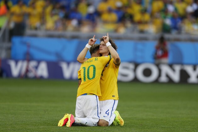 Brazil's Neymar and Brazil's David Luiz celebrate after the World Cup round of 16 soccer match between Brazil and Chile at the Mineirao Stadium in Belo Horizonte, Brazil, Saturday, June 28, 2014. Brazil won 3-2 on penalties. Brazil won 3-2 on penalties.(AP Photo/Frank Augstein) Brazil's Neymar and Brazil's David Luiz celebrate after the World Cup round of 16 soccer match between Brazil and Chile at the Mineirao Stadium in Belo Horizonte, Brazil, Saturday, June 28, 2014. Brazil won 3-2 on penalties. Brazil won 3-2 on penalties.(AP Photo/Frank Augstein)