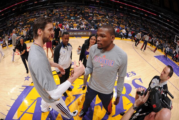 LOS ANGELES, CA - MARCH 9: Kevin Durant #35 of the Oklahoma City Thunder greets Pau Gasol #16 of the Los Angeles Lakers before the game at STAPLES Center on March 9, 2014 in Los Angeles, California. NOTE TO USER: User expressly acknowledges and agrees that, by downloading and/or using this Photograph, user is consenting to the terms and conditions of the Getty Images License Agreement. Mandatory Copyright Notice: Copyright 2014 NBAE (Photo by Andrew D. Bernstein/NBAE via Getty Images)