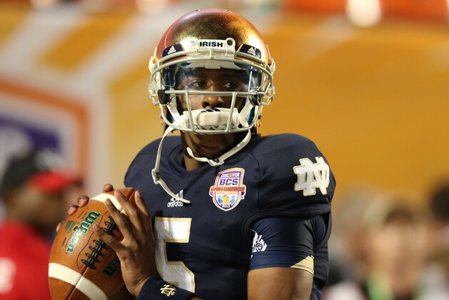Jan 7, 2013; Miami, FL, USA; Notre Dame Fighting Irish quarterback Everett Golson (5) throws prior to the game against the Alabama Crimson Tide during the 2013 BCS Championship game at Sun Life Stadium. Alabama won 42-14.  Mandatory Credit: Matthew Emmons-USA TODAY Sports