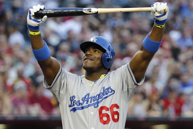 Arizona Diamondbacks Los Angeles Dodgers' Yasiel Puig reacts after striking out to end the fifth inning of a baseball game against the Arizona Diamondbacks on Saturday, May 17, 2014, in Phoenix. (AP Photo/Matt York)