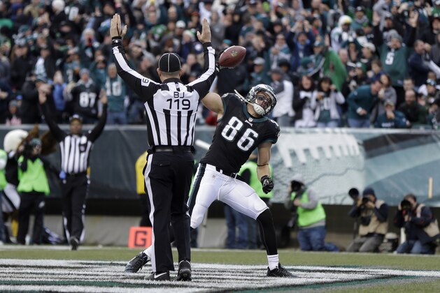 Philadelphia Eagles' Zach Ertz celebrates his touchdown reception during the second half of an NFL football game against the Arizona Cardinals Sunday, Dec. 1, 2013, in Philadelphia. (AP Photo/Matt Rourke)