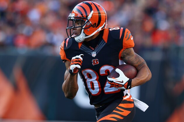 CINCINNATI, OH - OCTOBER 27:  Marvin Jones #82 of the Cincinnati Bengals runs with the ball during the NFL game against the New York Jets at Paul Brown Stadium on October 27, 2013 in Cincinnati, Ohio.  (Photo by Andy Lyons/Getty Images)