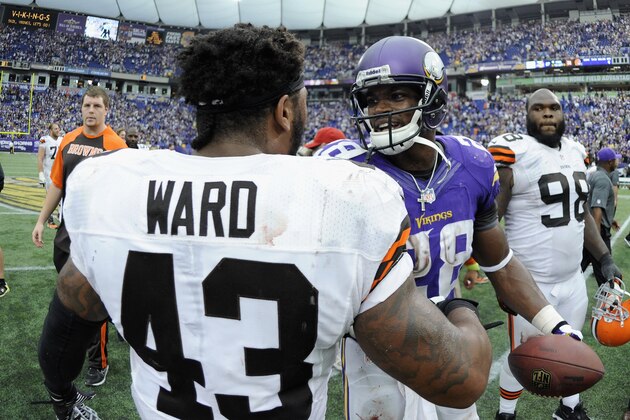 MINNEAPOLIS, MN - SEPTEMBER 22: T.J. Ward #43 of the Cleveland Browns and Adrian Peterson #28 of the Minnesota Vikings speak after the game on September 22, 2013 at Mall of America Field at the Hubert H. Humphrey Metrodome in Minneapolis, Minnesota. The Browns defeated the Vikings 31-27. (Photo by Hannah Foslien/Getty Images)