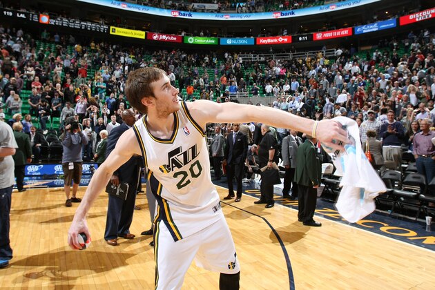 SALT LAKE CITY, UT - APRIL 14:  Gordon Hayward #20 and other players of the Utah Jazz throw autographed balls into the crowd after the game against the Los Angeles Lakers at EnergySolutions Arena on April 14, 2014 in Salt Lake City, Utah. NOTE TO USER: User expressly acknowledges and agrees that, by downloading and or using this Photograph, User is consenting to the terms and conditions of the Getty Images License Agreement. Mandatory Copyright Notice: Copyright 2014 NBAE (Photo by Melissa Majchrzak/NBAE via Getty Images)
